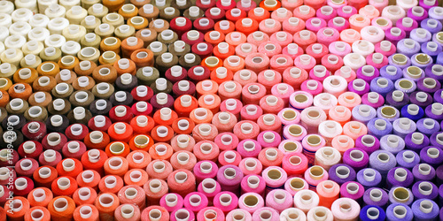 Fotografie Colored threads in a reel