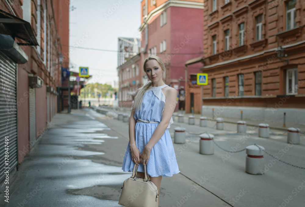 Outdoors portrait of beautiful young woman. Selective focus. Outdoors portrait of beautiful young woman. Selective focus.