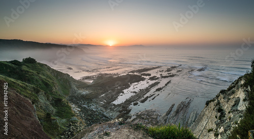 Sea mist over the coast cliffs in Sopelana