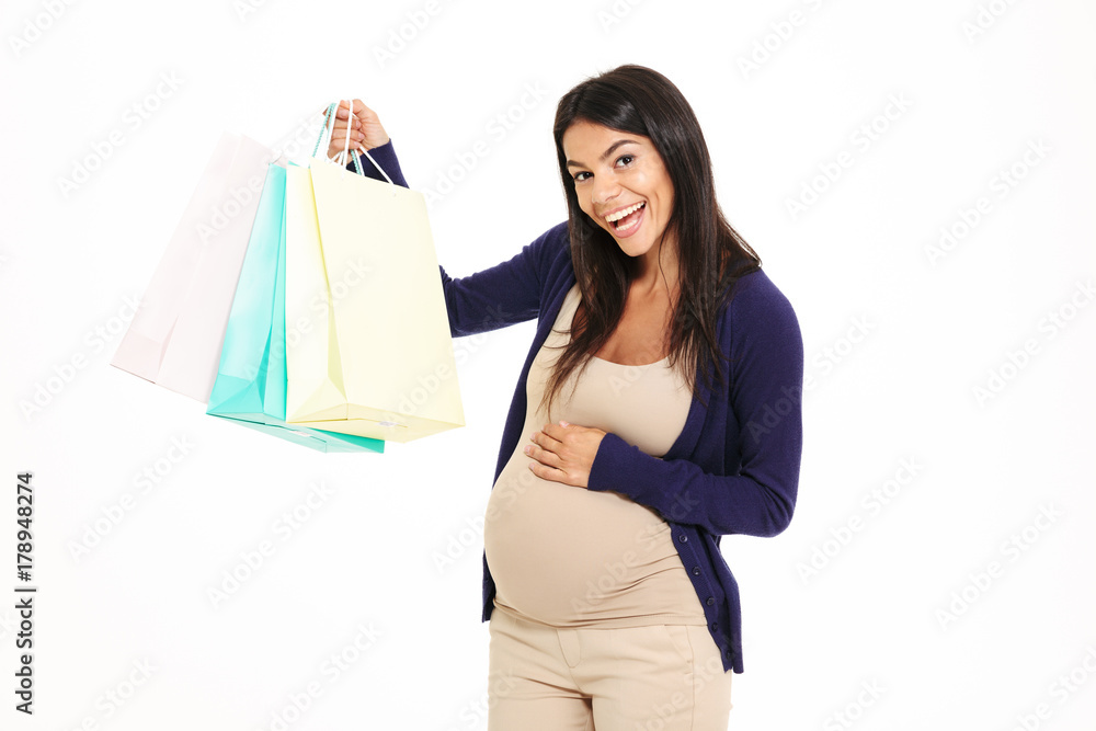 Portait of a satisfied young pregnant woman
