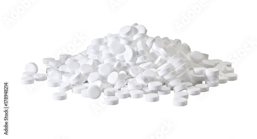 heap of white pills isolated on white background