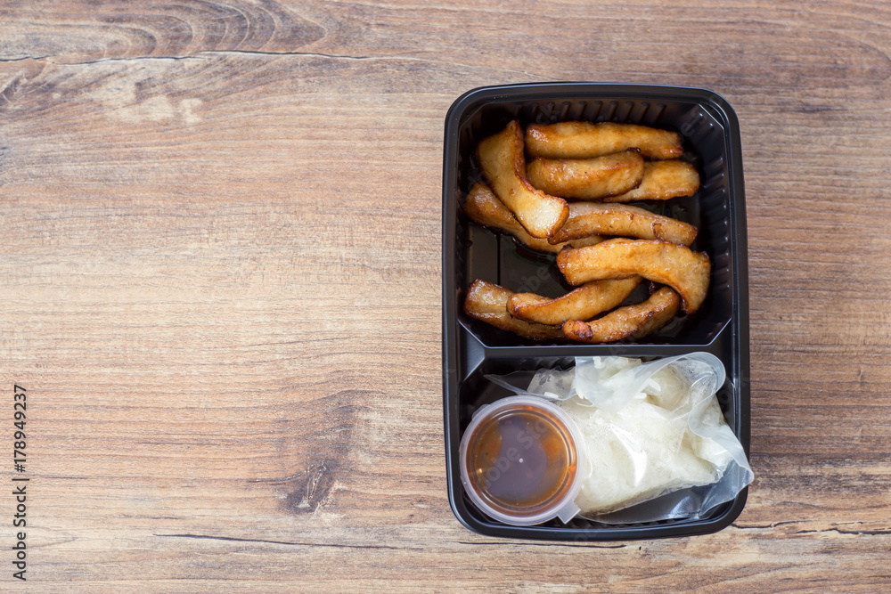 Fried meat and glutinous rice in the box. Fried meat and glutinous rice in the box.