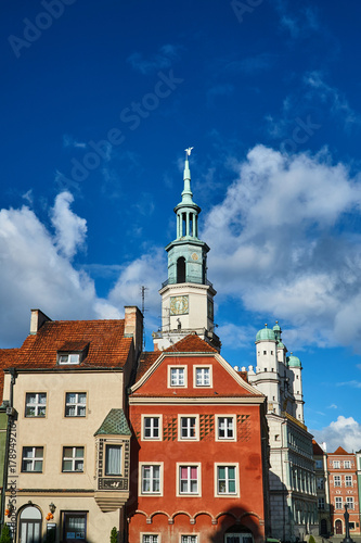 Old market with townhouses and Renaissance town hall tower in Poznan.