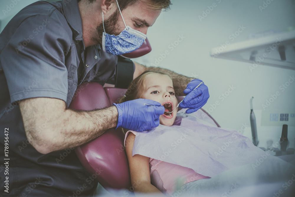 Preschool girl at dentist examination. Preschool girl at dentist examination.