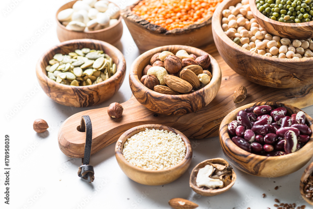 Legumes. seeds and nuts on white Legumes. seeds and nuts on white