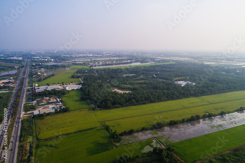 Aerial vew of rural road with car and gree tree into th west region of Thailand