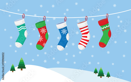 Christmas stockings for presents, hanging on a rope.