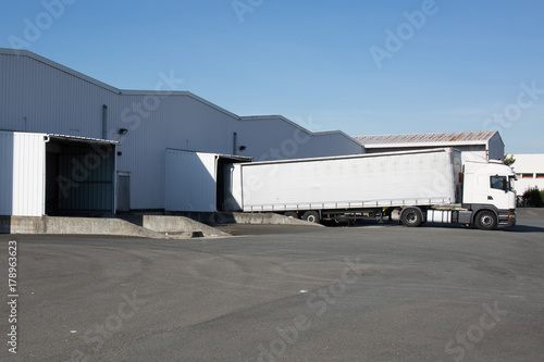 Cargo Transportation with Truck in the warehouse