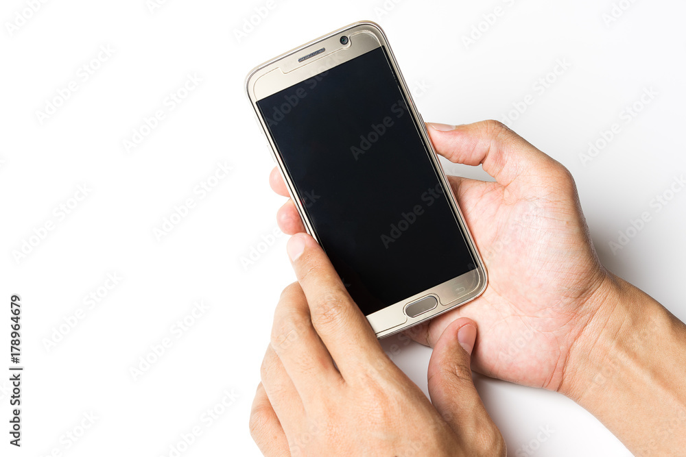 Online payment Concept. Man using smart phone on office desk and clock on white background Online payment Concept. Man using smart phone on office desk and clock on white background