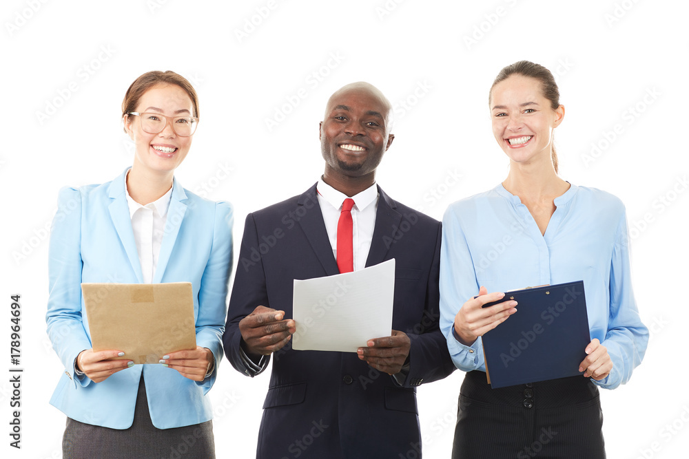 Portrait of confident multi-ethnic business team of three on white background Portrait of confident multi-ethnic business team of three on white background