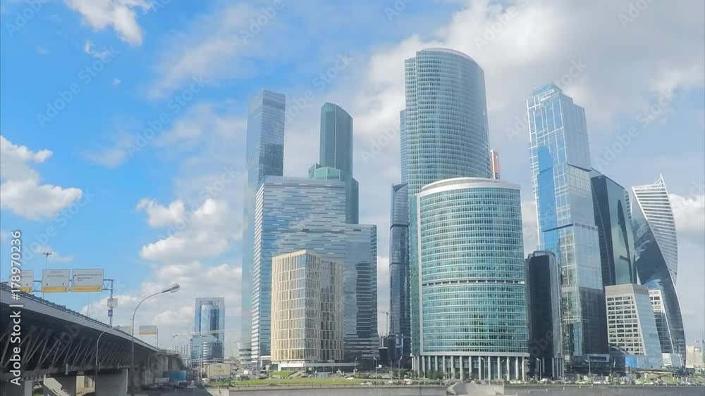 modern skyscrapers and bridge at summer day timelapse modern skyscrapers and bridge at summer day timelapse