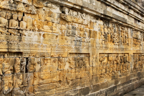 Big wall relief in Borobudur - 9th-century Mahayana Buddhist temple. The world's largest Buddhist temple.