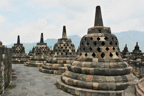 Borobudur - world's largest Buddhist temple built in 9th-century. Mahayana Buddhist temple with many stupa around.