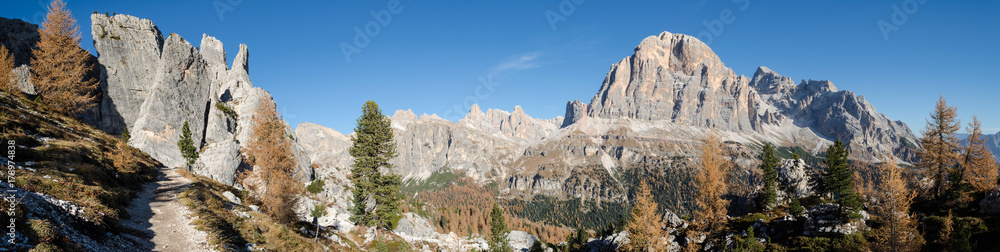 Panoramic view of rocky mountains in gorgeous autumn day