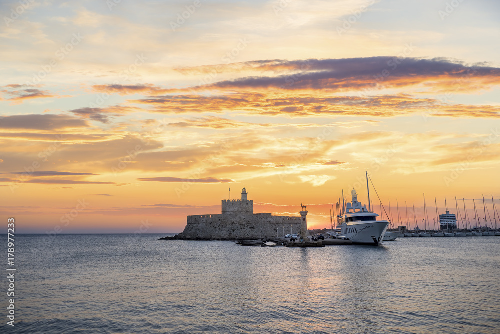 Agios Nikolaos fortress on the Mandraki harbour of Rhodes Greece Agios Nikolaos fortress on the Mandraki harbour of Rhodes Greece