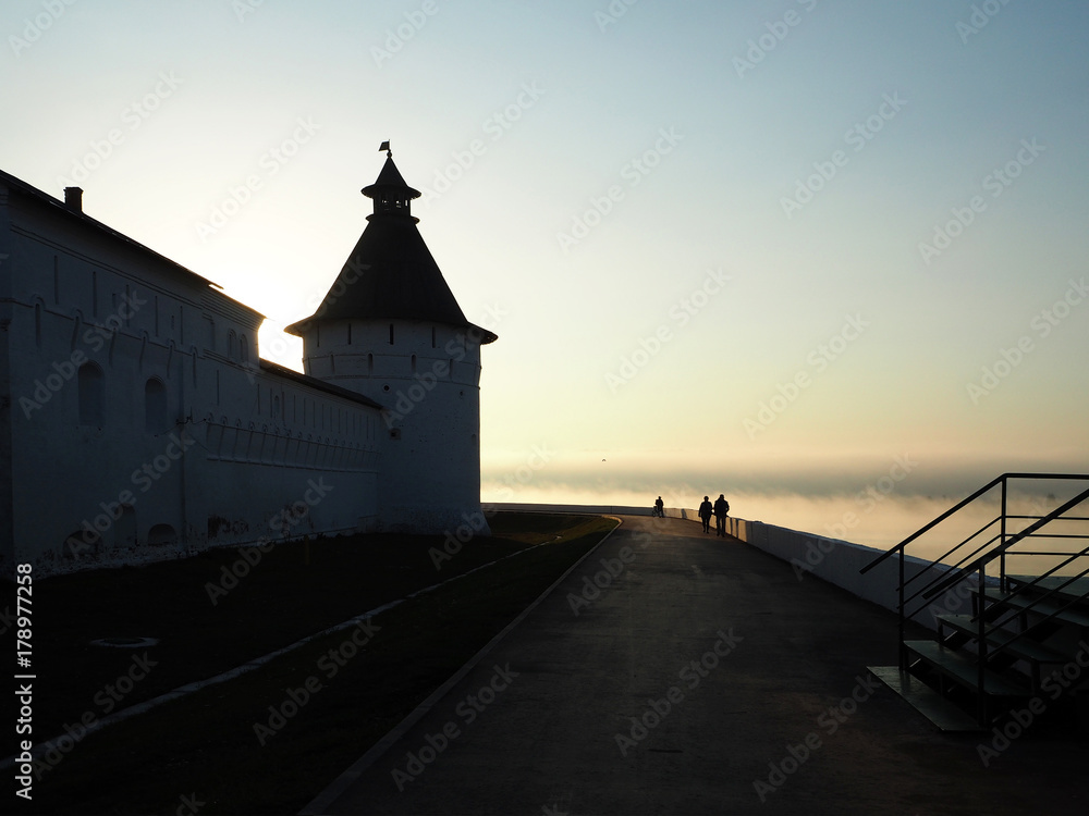 The walls of the Russian Orthodox monastery at dawn in the fog. Silence, peace and tranquility
