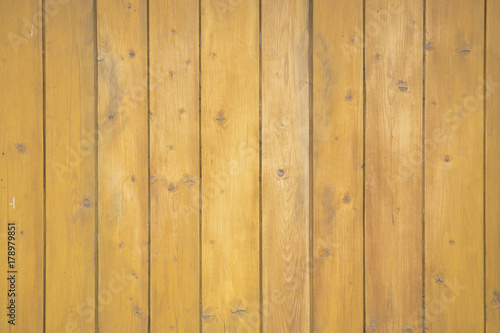 Yellow thin boards. Knots in wood. Wooden background for design