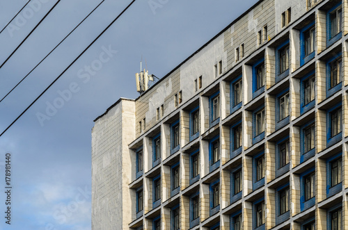 Facade of an old high-rise building. Urbanization concept photo