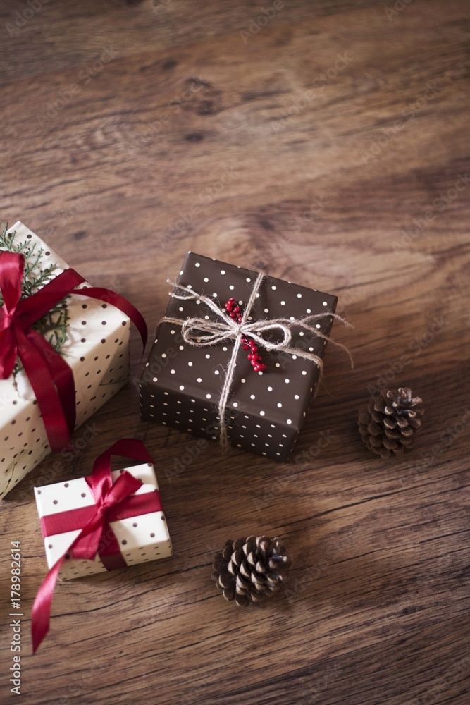 christmas gifts on wooden background christmas gifts on wooden background