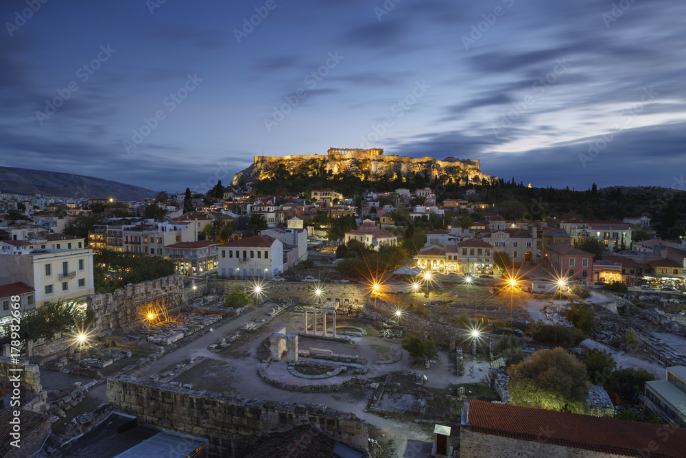 View of Acropolis from a roof top coctail bar at sunset, Greece. 
