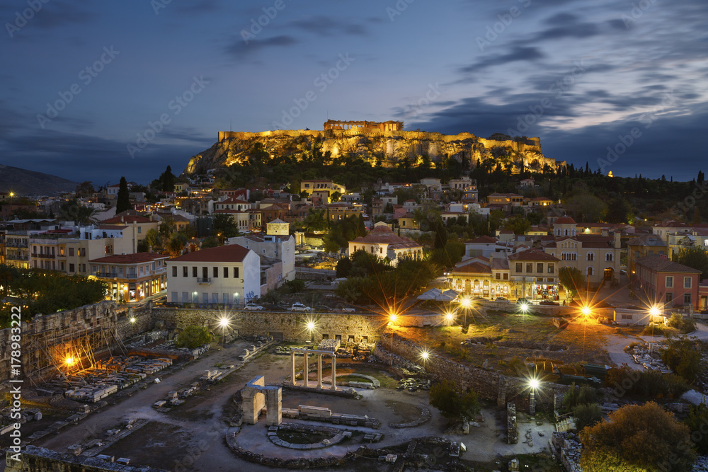 Fototapeta premium View of Acropolis from a roof top coctail bar at sunset, Greece. 