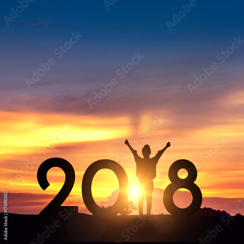 Freedom female Enjoying on the hill and 2018 years while celebrating new year, copy space, Silhouette. 
