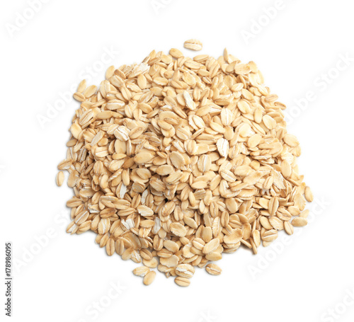 Raw oatmeal on white background