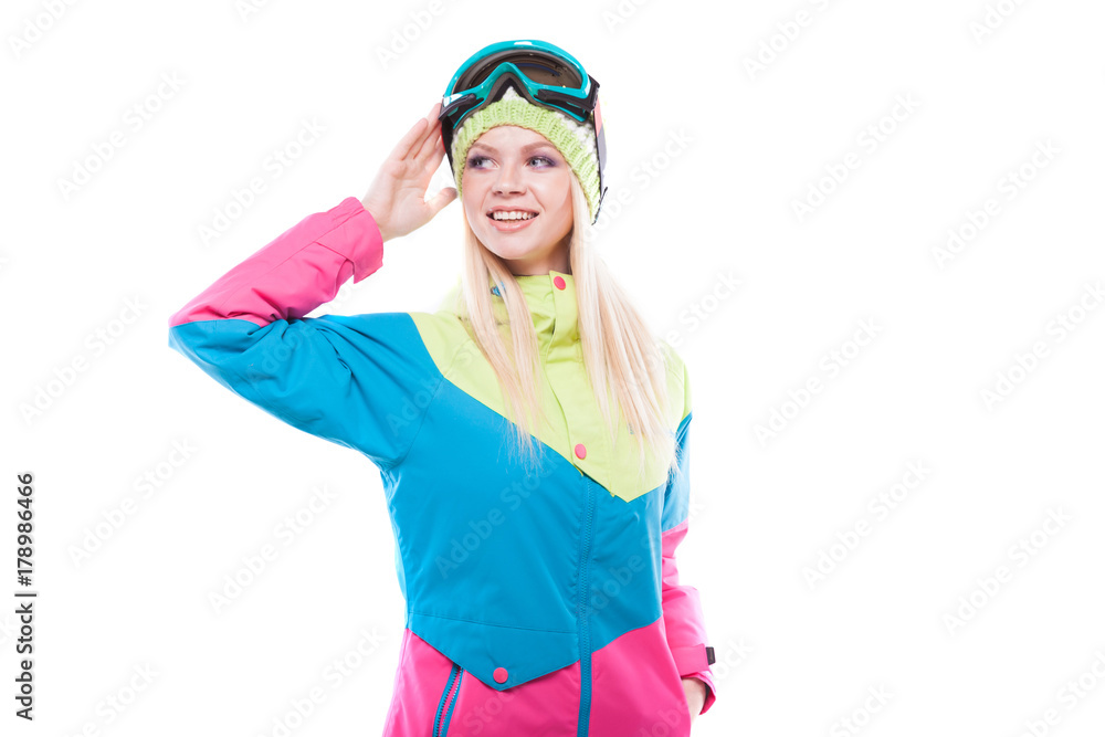 Fototapeta premium pretty young woman in ski outfit and ski glasses