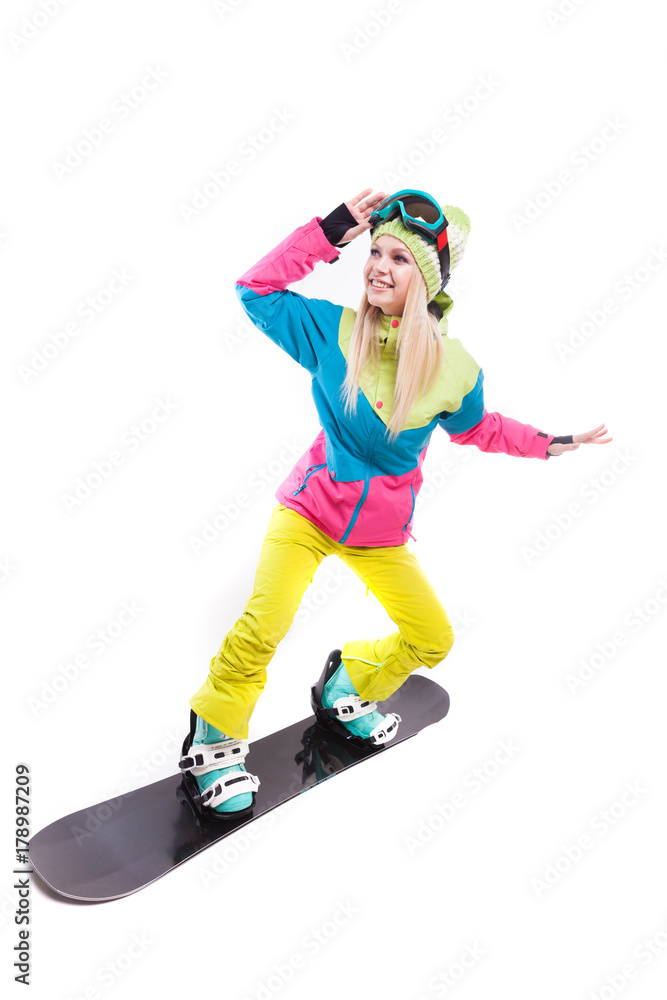 beauty young woman in ski suit and ski glasses ride snowboard beauty young woman in ski suit and ski glasses ride snowboard