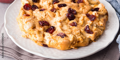 Apple pie with dried cranberries. Autumn baking with apples