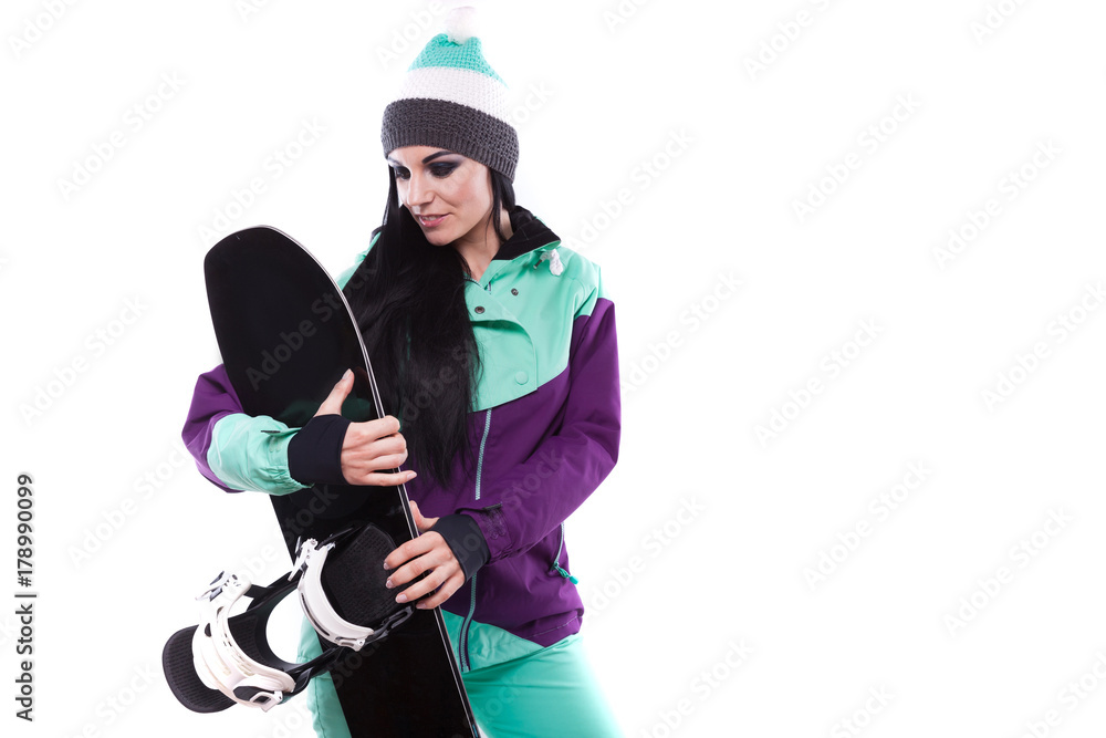 young beautiful woman in purple ski suit hold snowboard young beautiful woman in purple ski suit hold snowboard