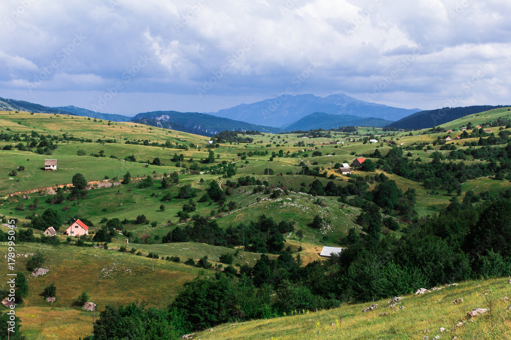 Fields, meadows, mountains, roads. Balkans. An aerial top-view