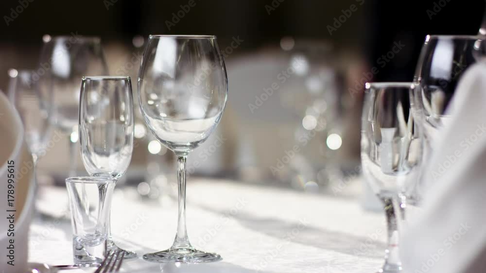 View of banquet table prepared for celebration dinner at restaurant View of banquet table prepared for celebration dinner at restaurant