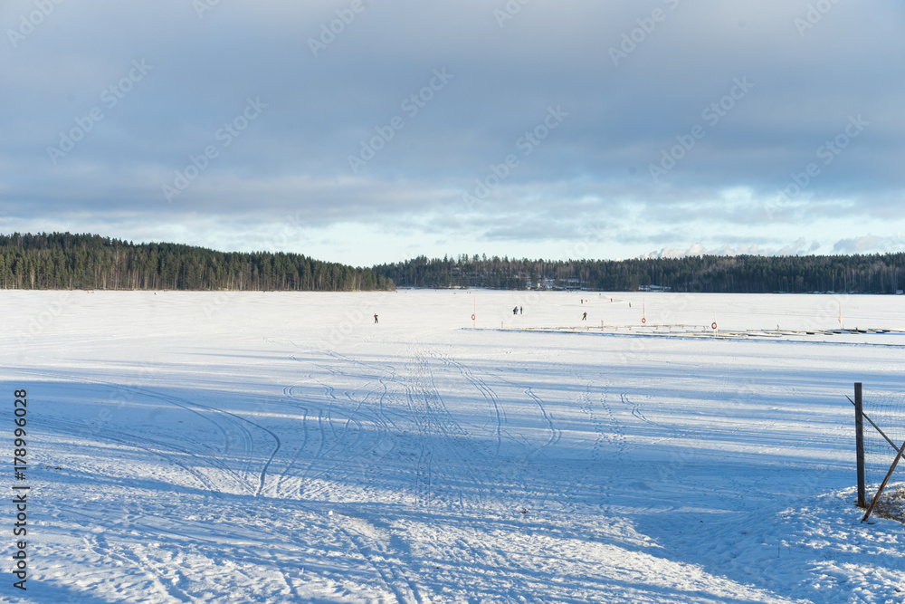 Ice rink on the frozen lake in Finland