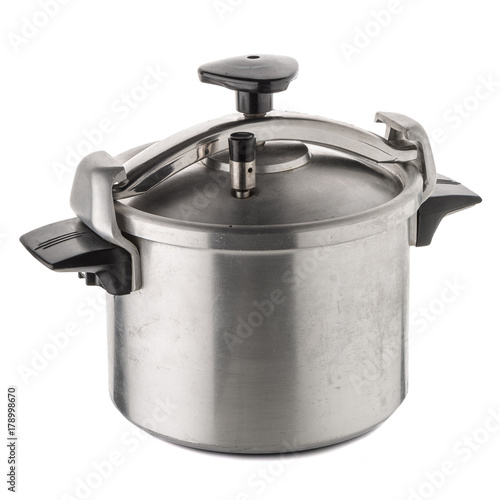 Used pressure cooker for cooking over white background.