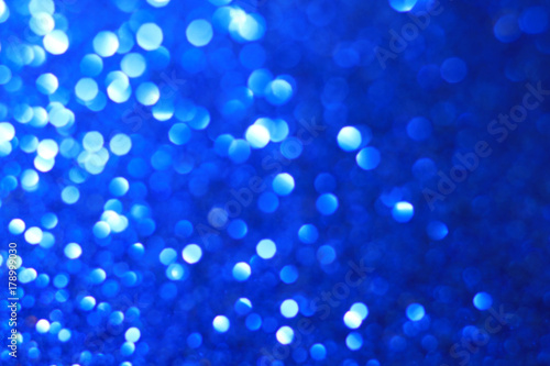 Glitter blue bokeh abstract background 