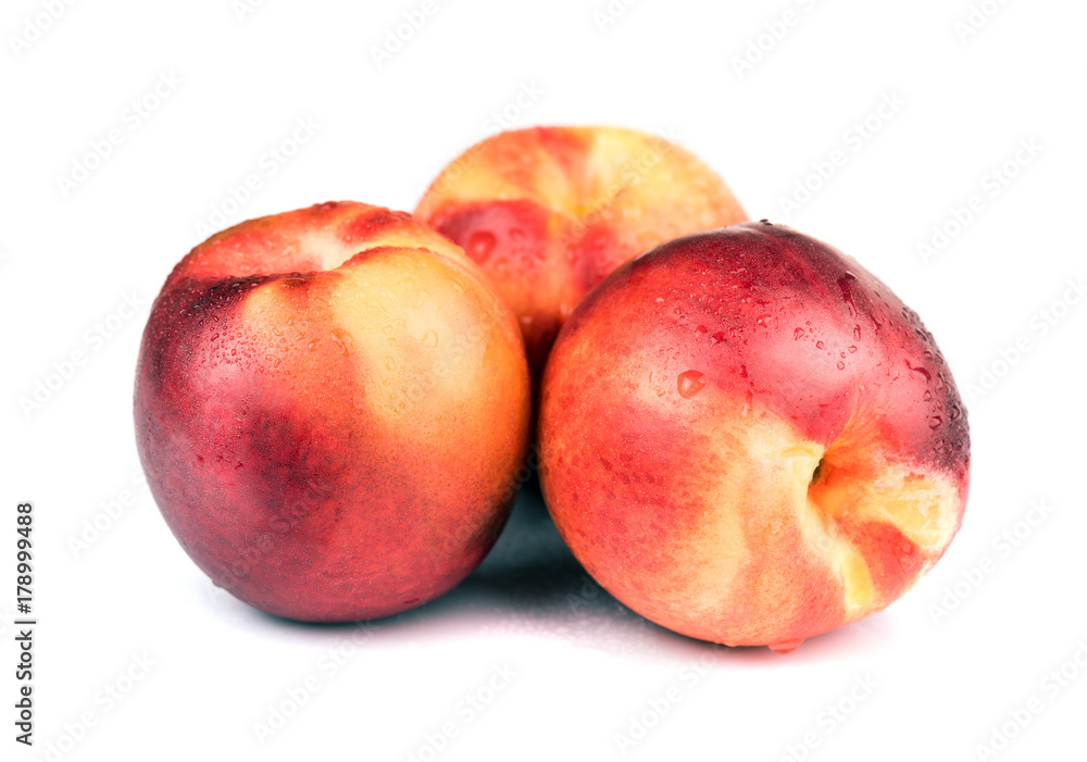 Fresh raw nectarine isolated on white Fresh raw nectarine isolated on white