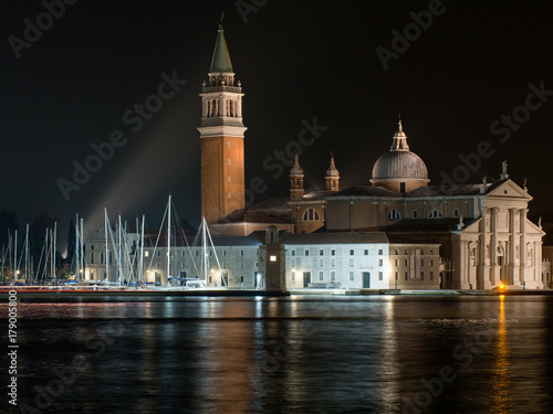 Night view of San Giorgio Maggiore across the lagoon, Venice, Italy.