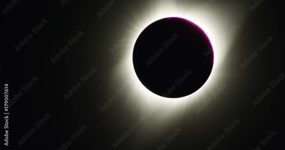 The diamond ring effect appears as the solar eclipse totality ends over Mackay, Idaho