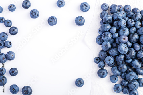 Fresh raw organic farm blueberry white background, copy space