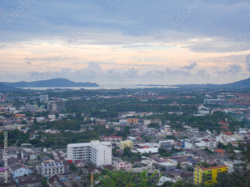 This is a panoramic view on the mountain viewpoint. See the city and the sea in the distance. Beautiful evening sky It is a great place to take pictures and relax.