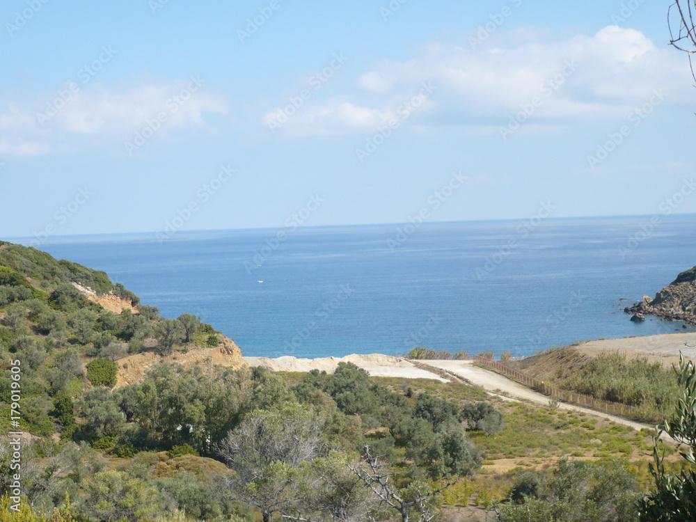 Airport landing strip very close to the street and beach Airport landing strip very close to the street and beach