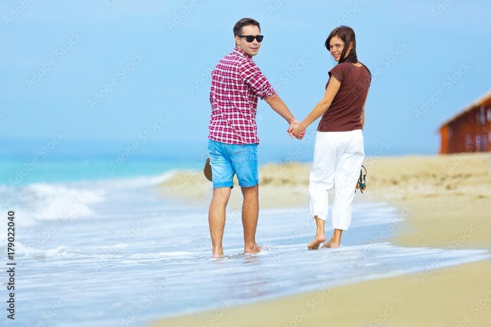 Portrait of a Happy Smiling Couple at the Beach Portrait of a Happy Smiling Couple at the Beach