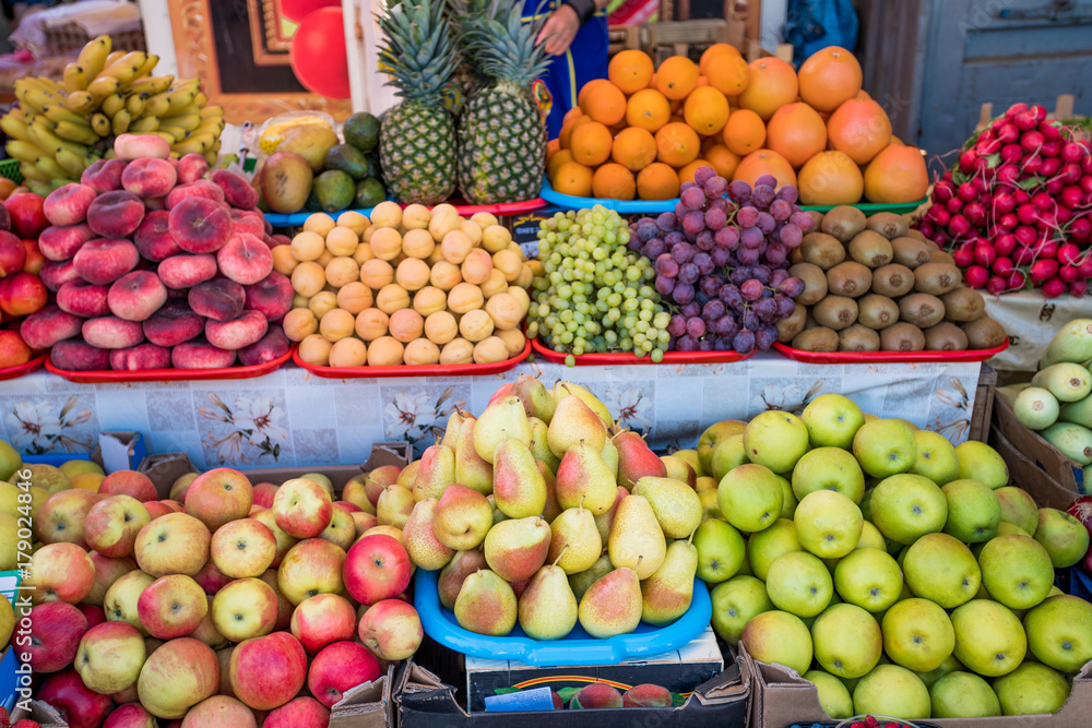 Fruit market with various colorful fresh fruits. Fresh fruits.  Fruits  at a farmers market
