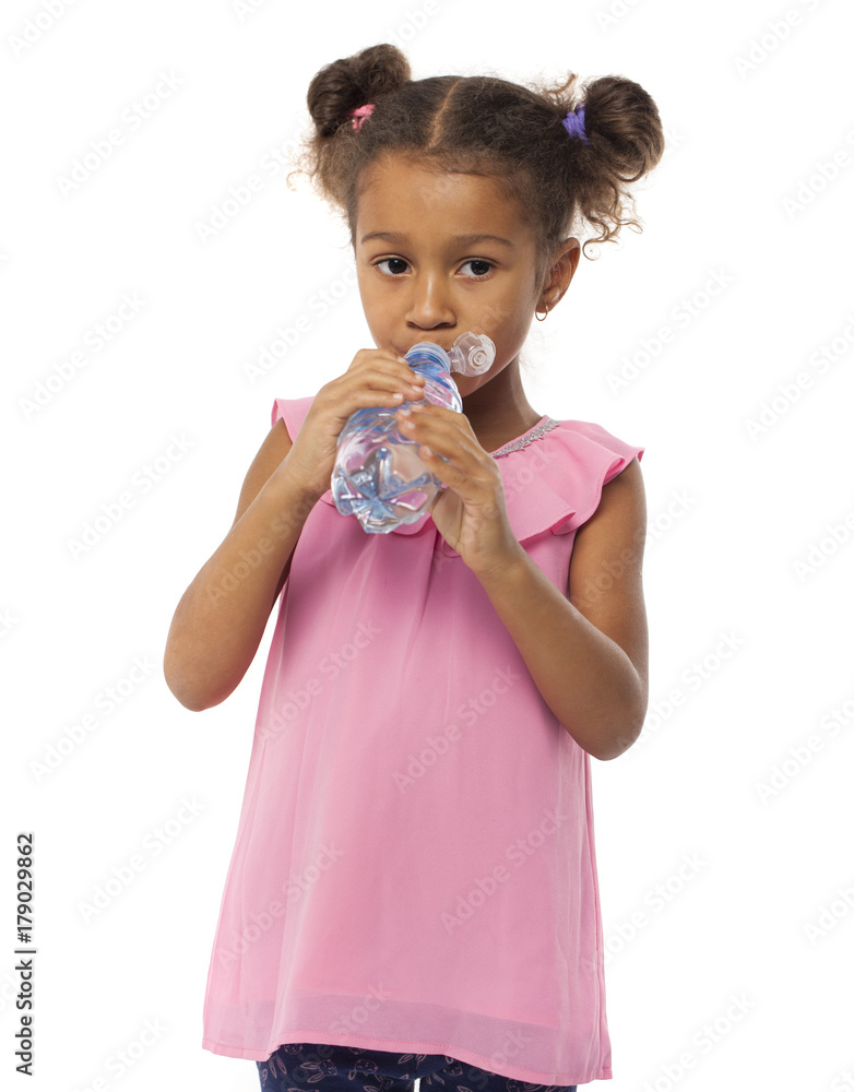 Little african girl drinks water from a bottle Little african girl drinks water from a bottle
