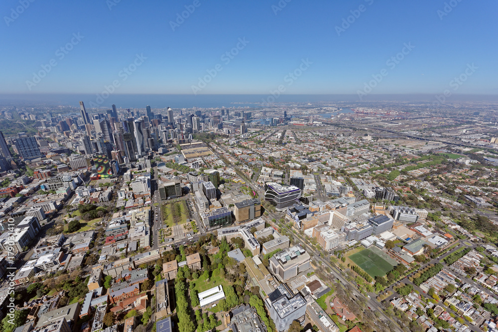 Naklejka premium Aerial view of Royal Melbourne Hospital, looking south-west to CBD and Docklands