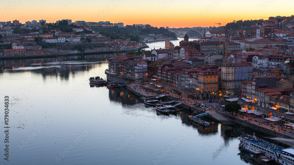 Night view of the Douro river and Ribeiro, Porto, Portugal.