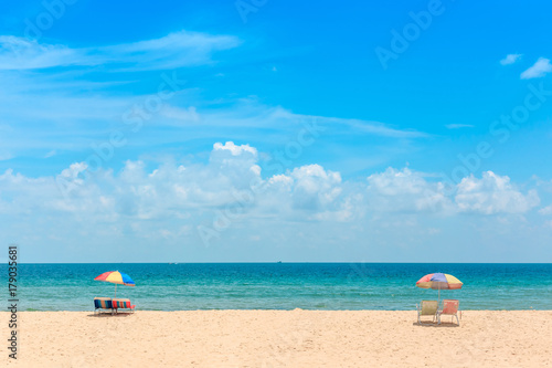 Ka-ron Beach at Phuket , Thailand. White sand beach with beach umbrella. Summer, Travel, Vacation and Holiday concept.