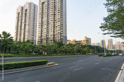 Road with modern building background during rush hour