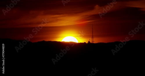 Telephoto shot of sunset over Hollywood Hills, Los Angeles, California